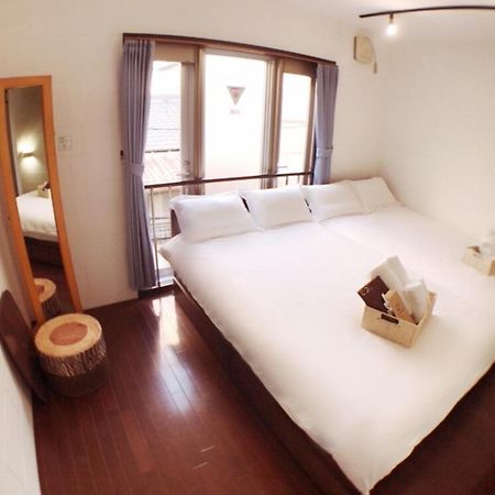 Osaka Sinsei Guest House Екстер'єр фото